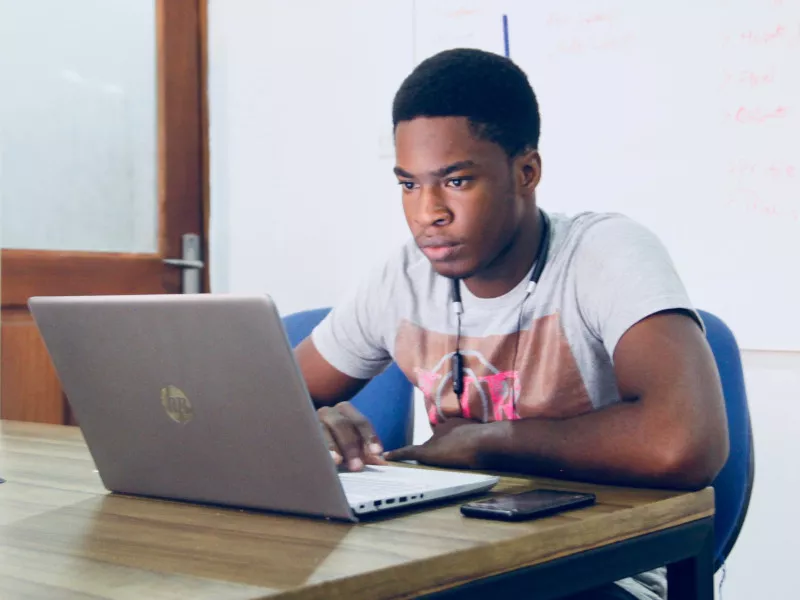 college student with laptop